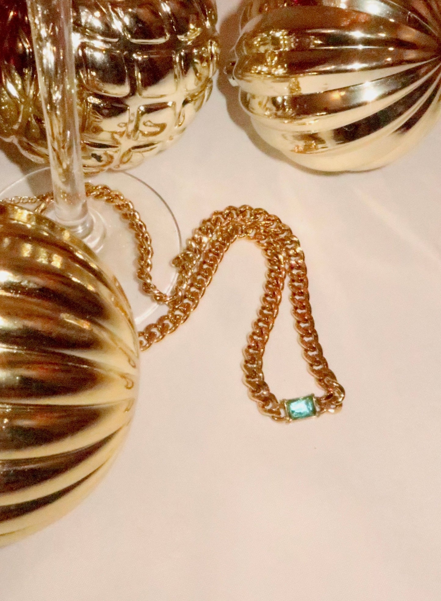 Gold choker necklace with blue stone