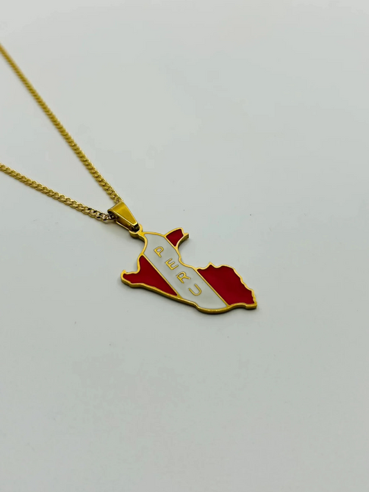 Close-up of engraveable Peru map pendant on gold chain