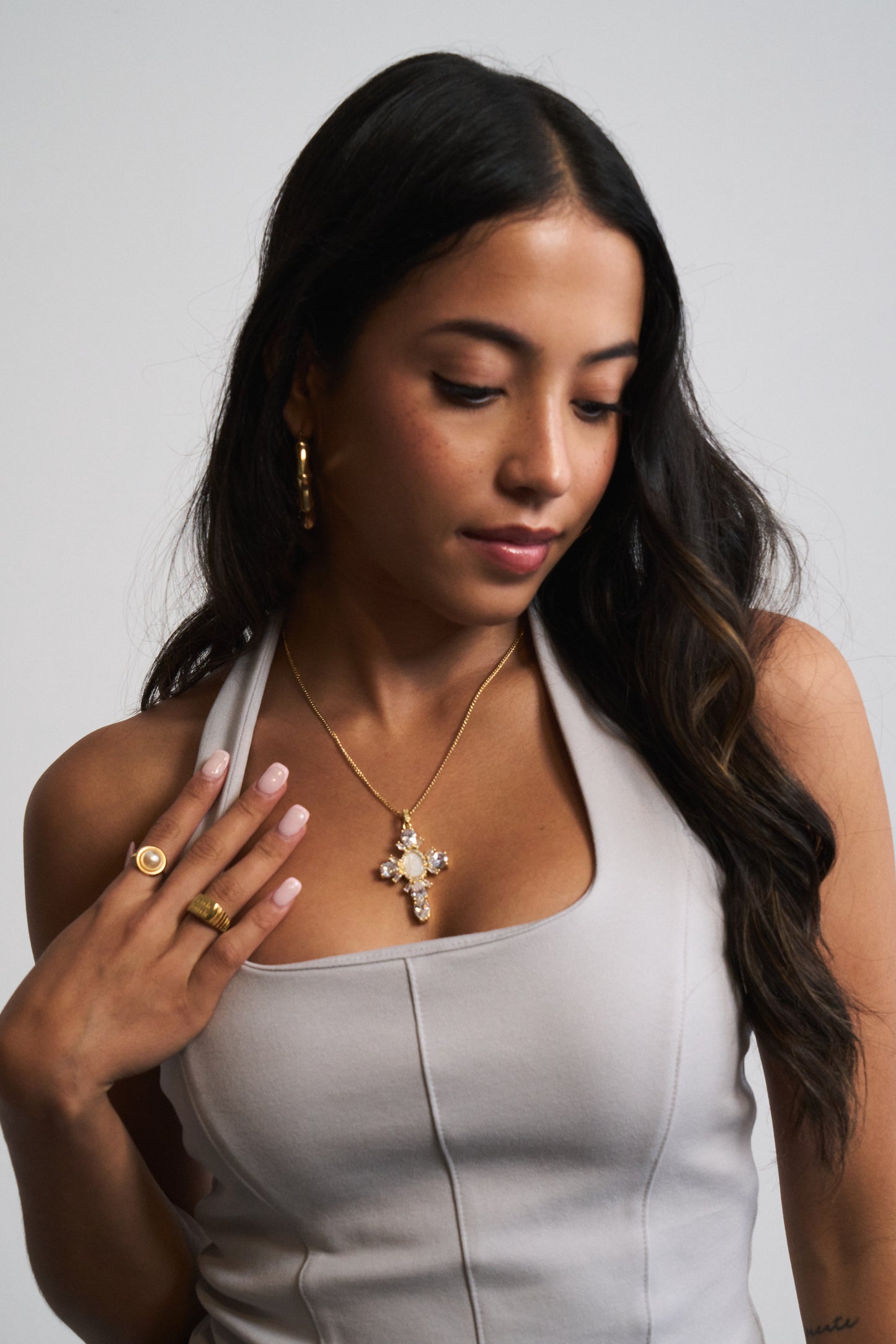 Gold religious necklace with adjustable chain and crystal detail