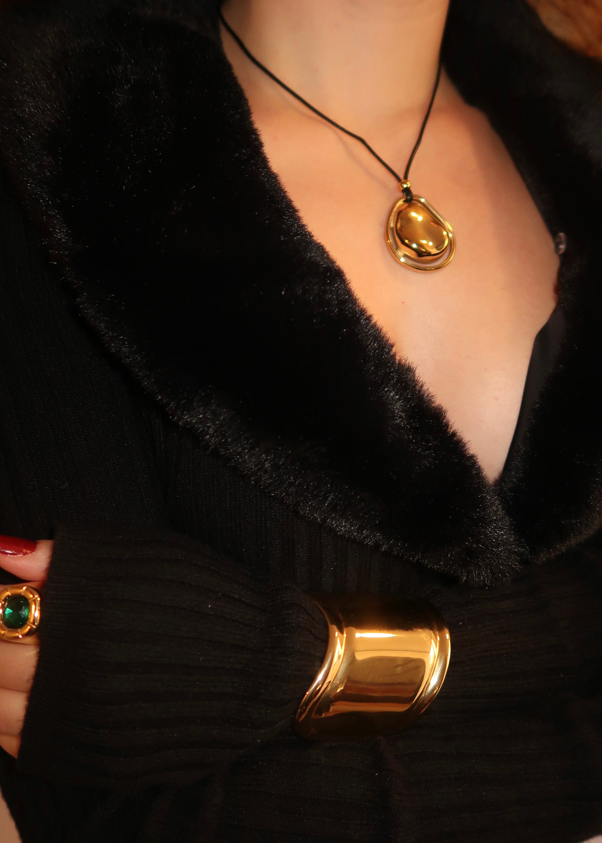 Layered necklaces featuring circle pendant cord necklace