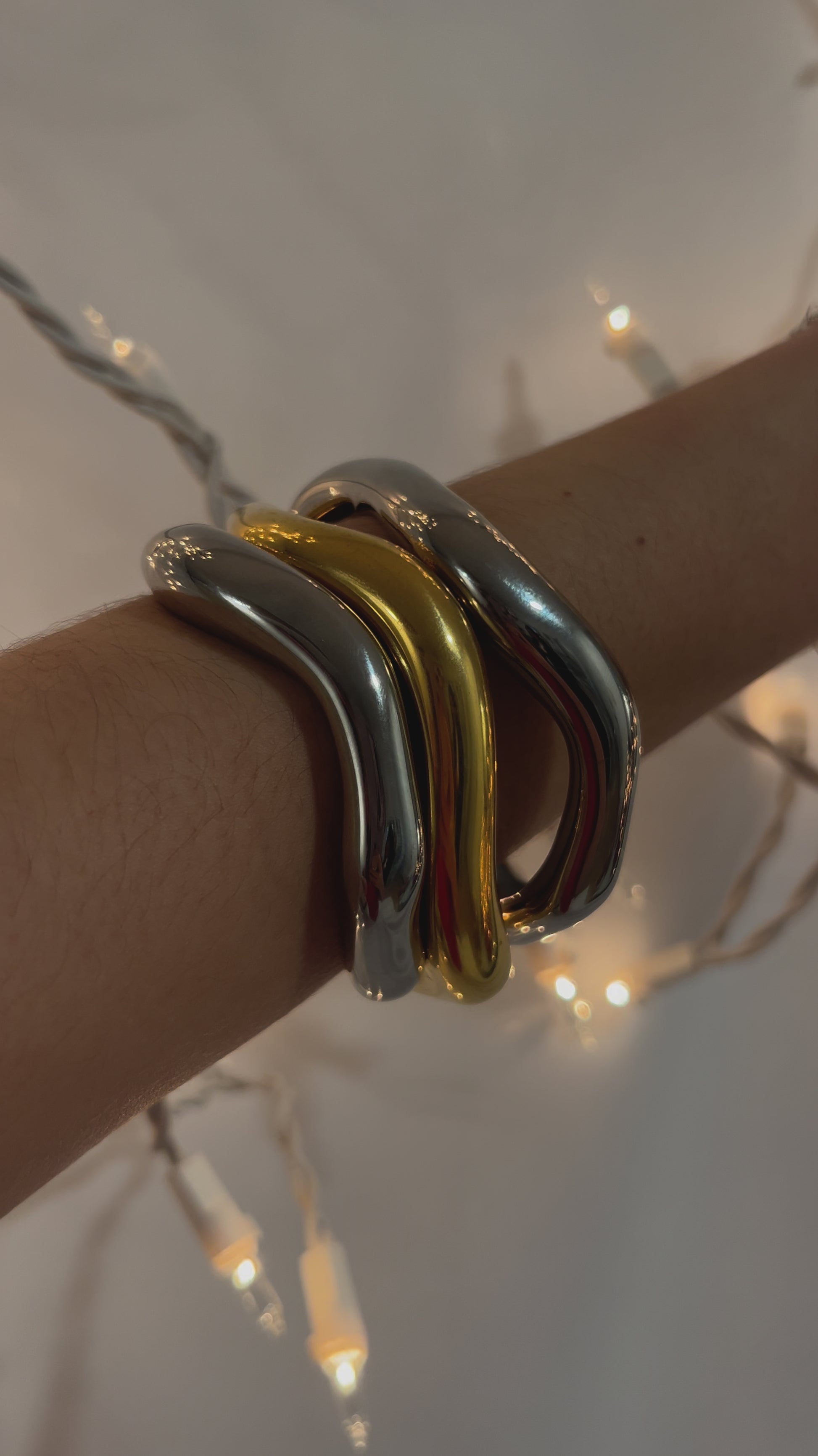 Close-up of silver minimalist bracelet – waterproof stainless steel