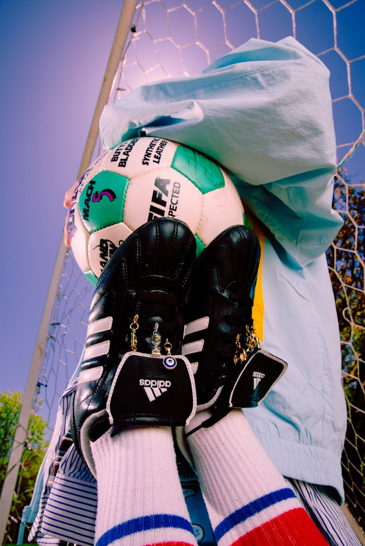 Soccer cleats with charms 