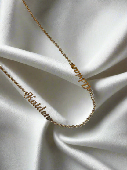 two name chain perfect for gifting on a white fabric 