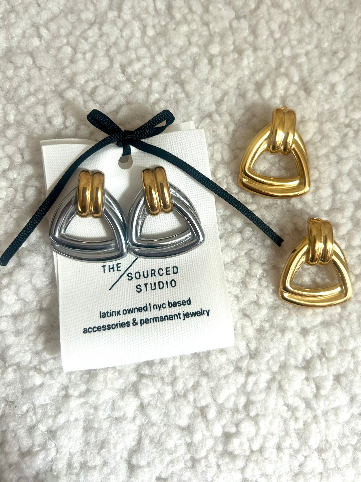 Close-up of chunky gold dome earrings – modern vintage jewelry