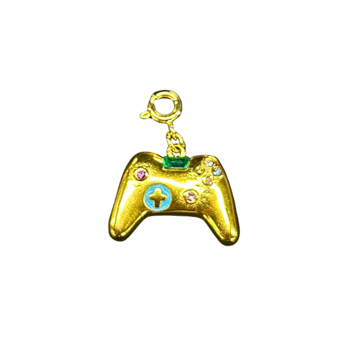 Gold-colored gaming controller charm with colorful accents on a white background