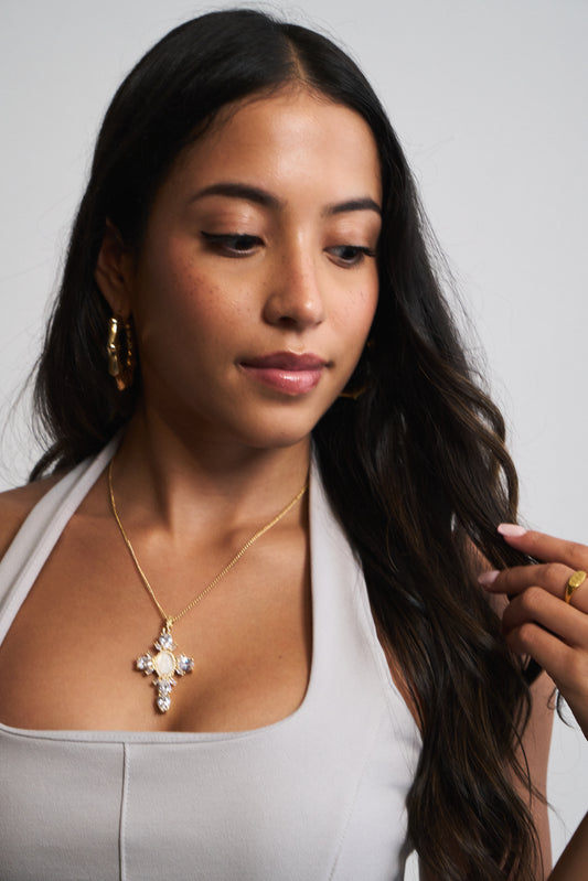 Gold crystal cross necklace called Luz Divina with clear stones