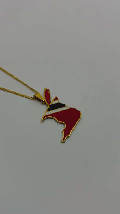 Flat lay of engraved Trinidad and Tobago necklace
