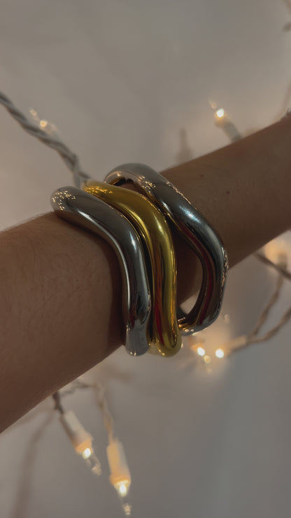 Close-up of silver minimalist bracelet – waterproof stainless steel