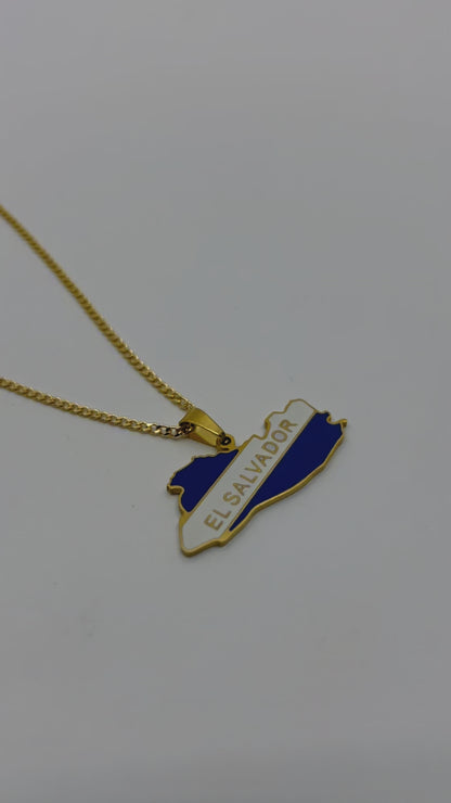 El Salvador map necklace styled with layered gold chains