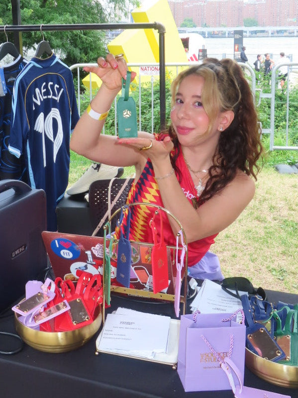Person interacting with engraving machine in an outdoor setting adidas home of soccer